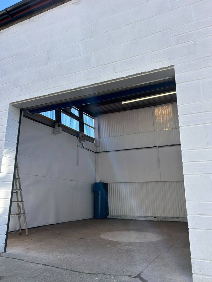 Inside a refurbished workshop unit with new lighting